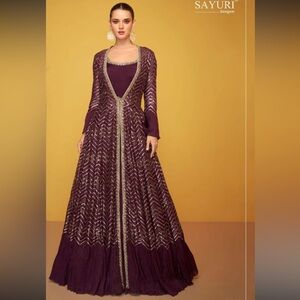 Exclusive long gown with gold detailing